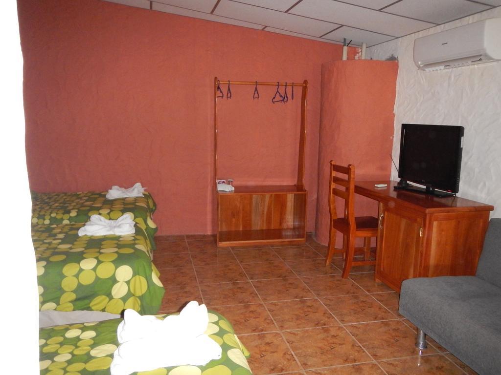 Hospedaje Casa Soleil Puerto Villamil Værelse billede