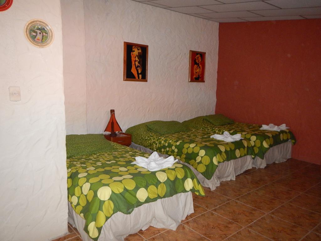 Hospedaje Casa Soleil Puerto Villamil Værelse billede