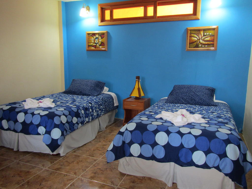 Hospedaje Casa Soleil Puerto Villamil Værelse billede